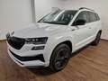 Skoda Karoq Sportline 4x4 2.0 TSI DSG Matrix Navi AHK Wit - thumbnail 1