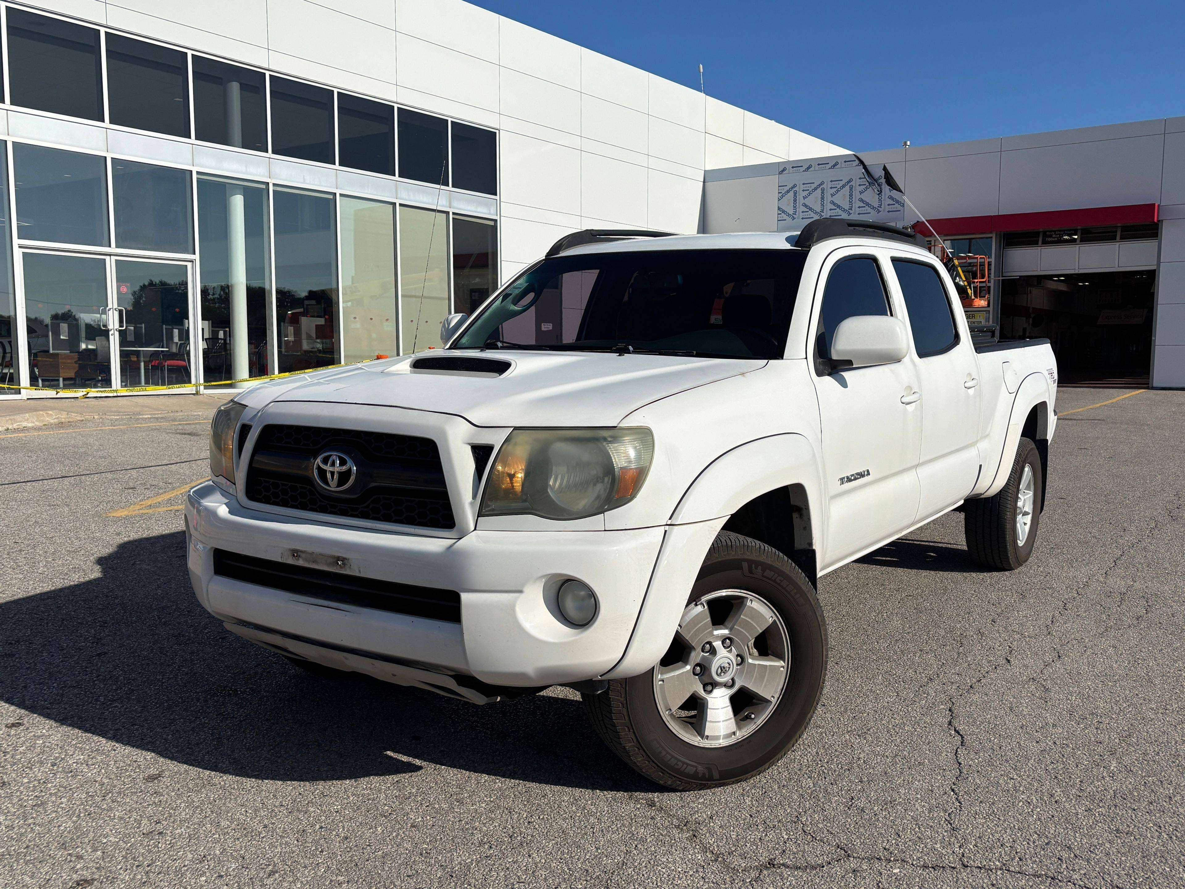 used 2011 Toyota Tacoma car, priced at $14,795