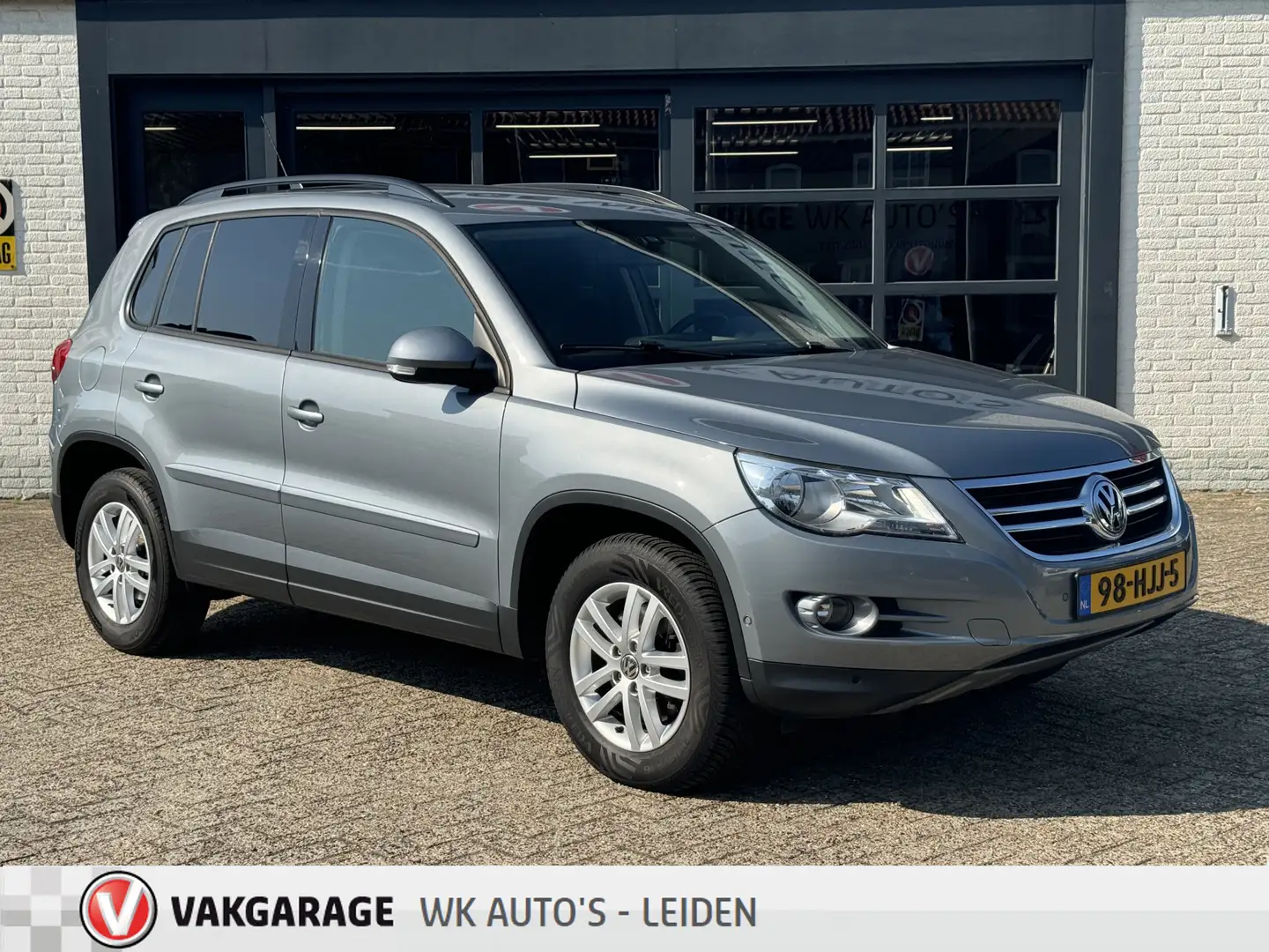 Volkswagen Tiguan 2.0 TSI Track&Field 4Motion - trekhaak - Navi - Cr Gris - 1
