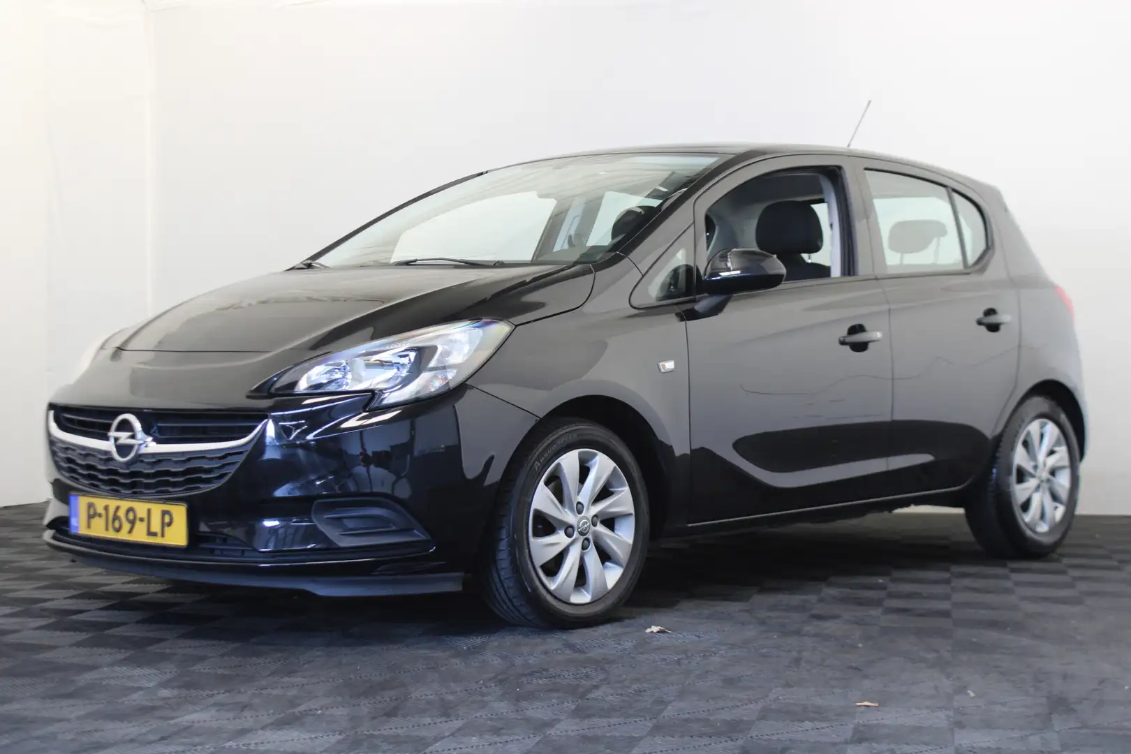 Opel Corsa 1.2 Zwart - 1