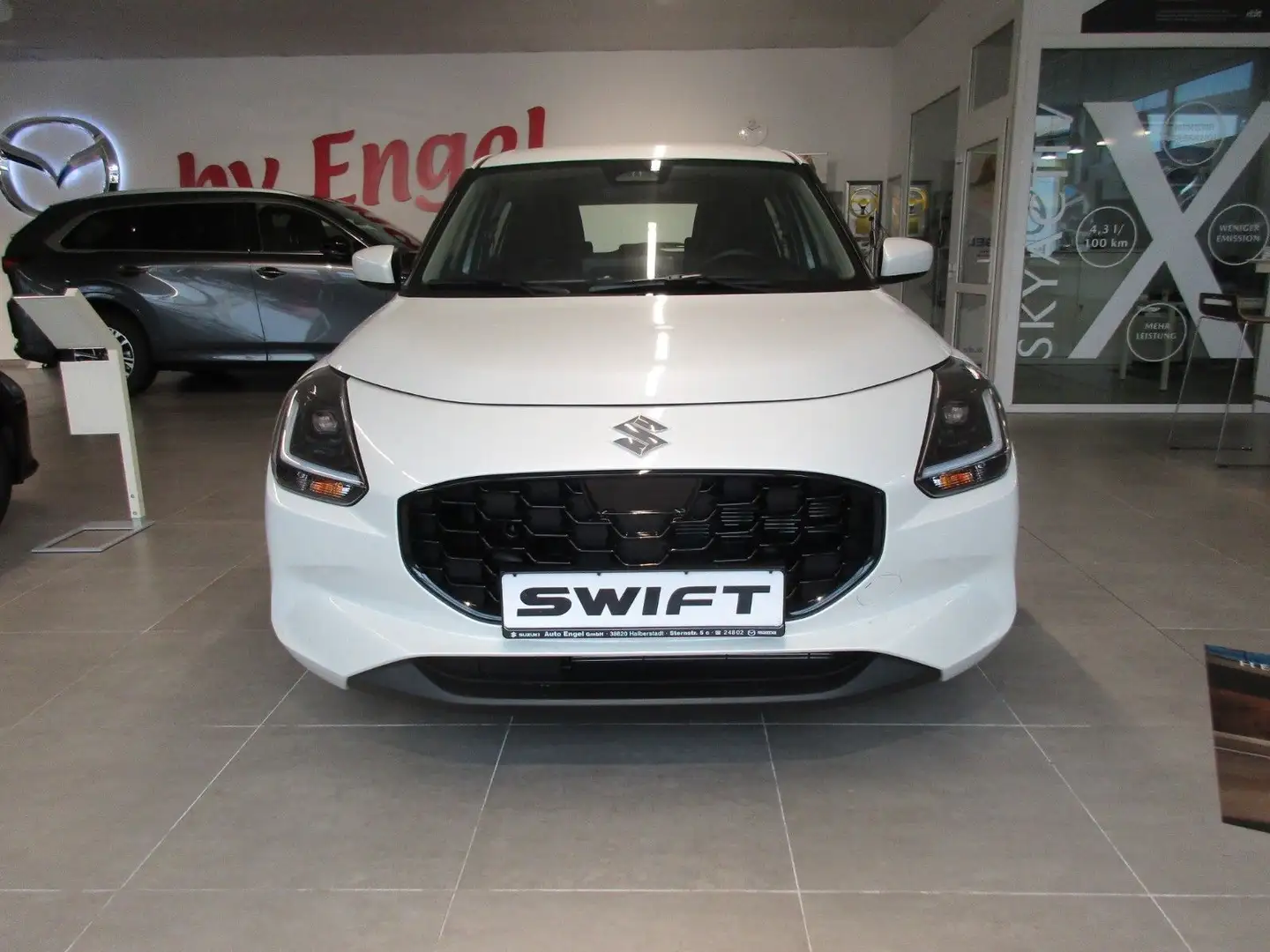 Suzuki Swift 1.2 HYBRID MT Club Wit - 1