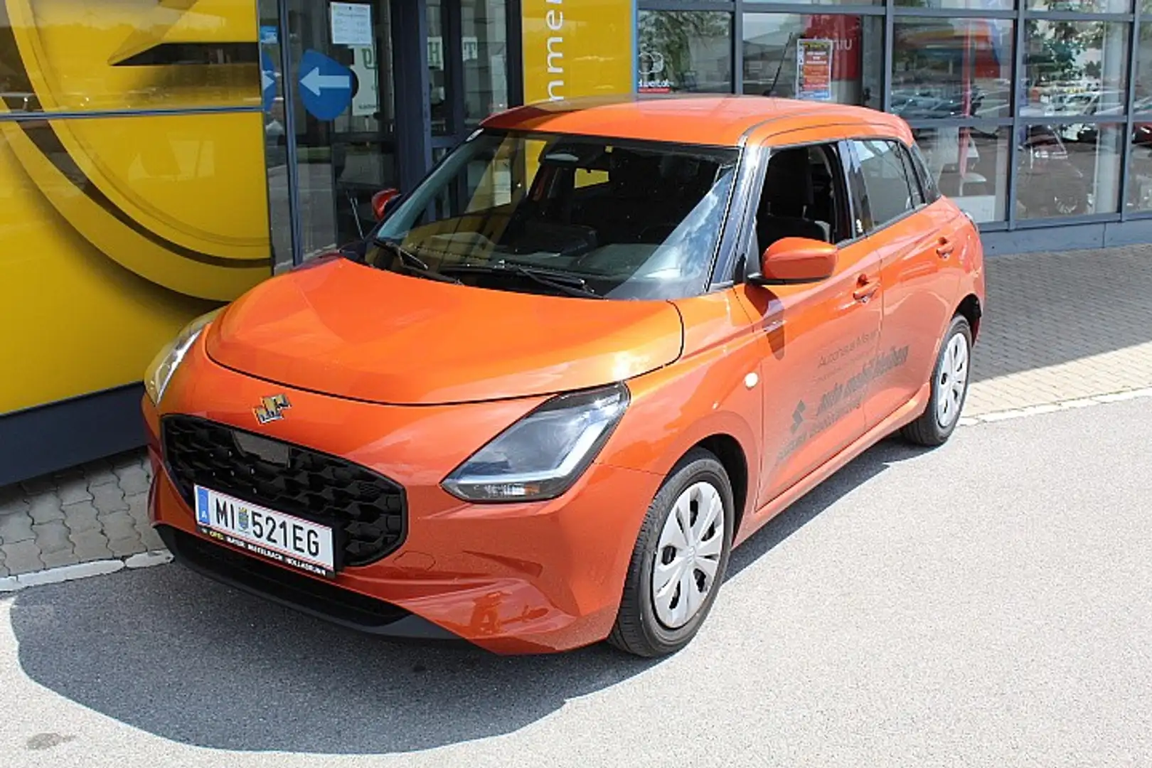 Suzuki Swift 1,2 Hybrid Clear Orange - 1