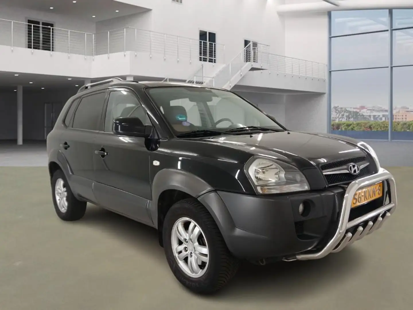 Hyundai TUCSON 2.0i Style|lage km met nap|psensor|stoelverw|leder Zwart - 2