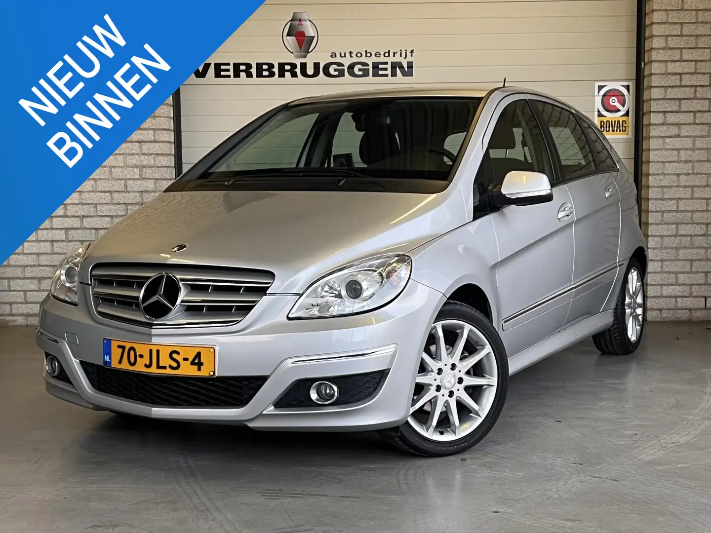 Mercedes-Benz B 150 | 17" LMV | Trekhaak | Navi| Climate | PDC | Bluet Grijs - 1