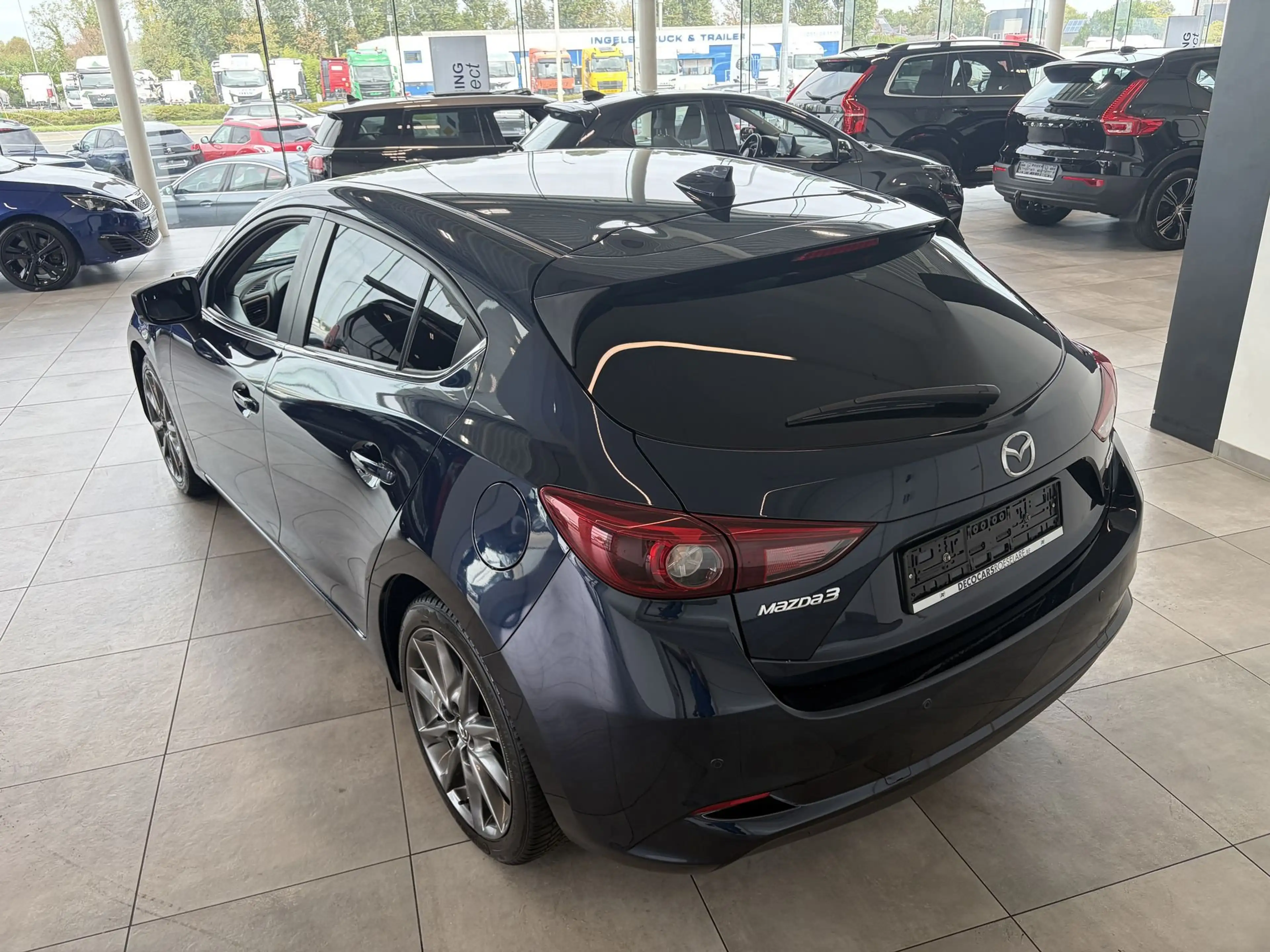 Mazda 3 Navigatie / Camera / Zetel & Stuurverwarming / Keyless / Head Up Display / — photo 9