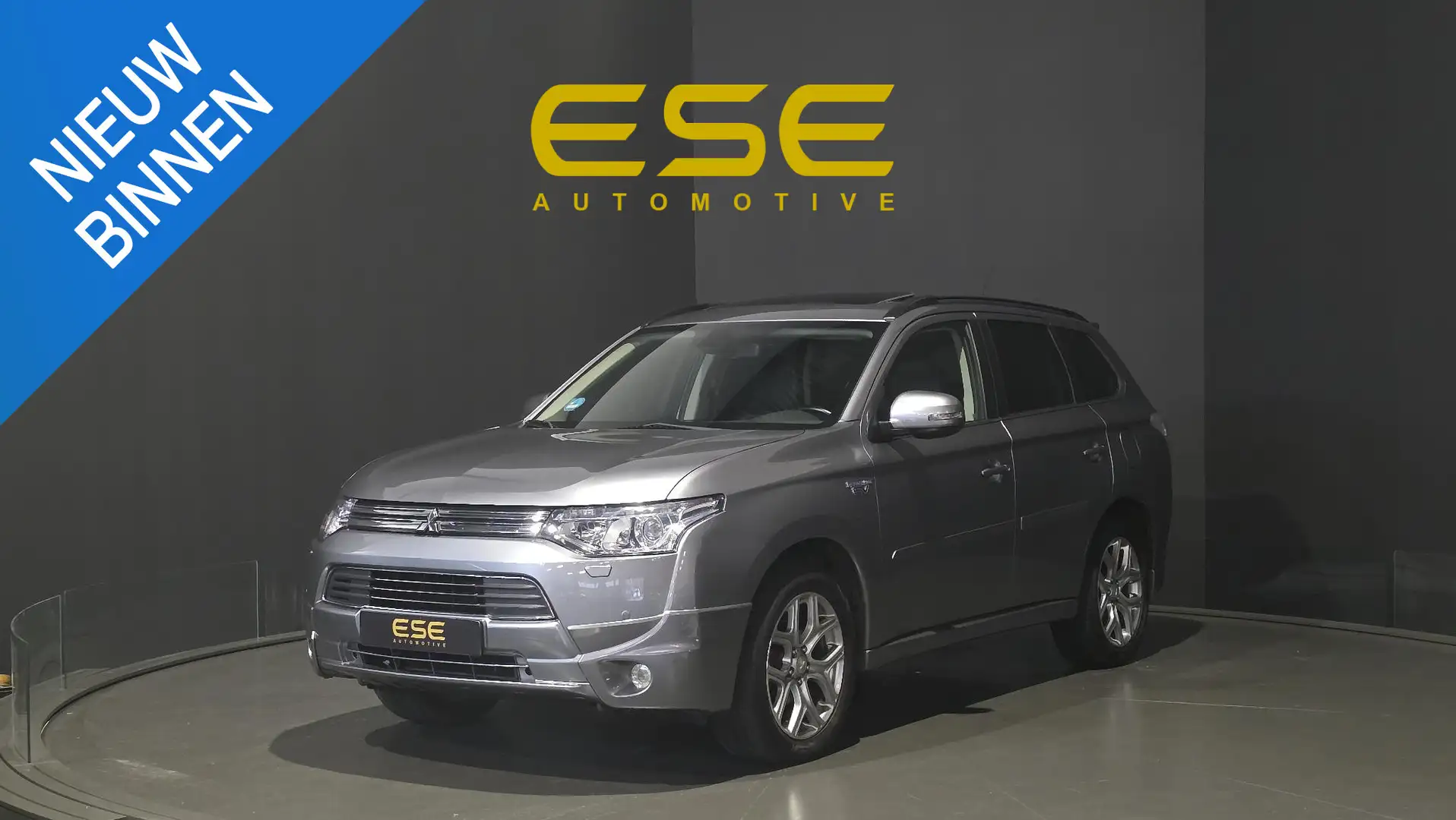 Mitsubishi Outlander 2.0 PHEV Instyle+ | Trekhaak | Schuif-/kanteldak | Gris - 1