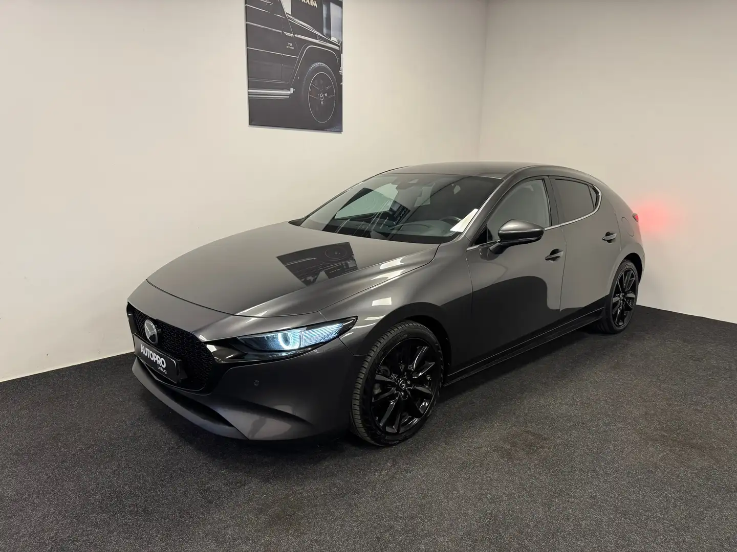 Mazda 3 2.0 e-SkyActiv-X M Hybrid 180 Luxury Grijs - 1