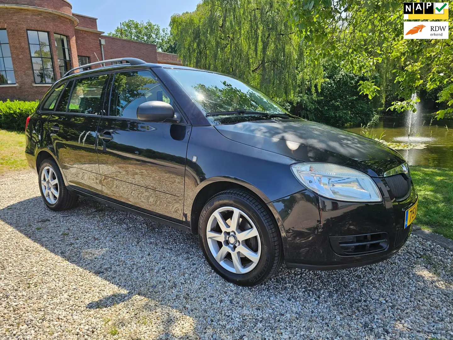 Skoda Fabia Combi 1.2 Go Zwart - 1