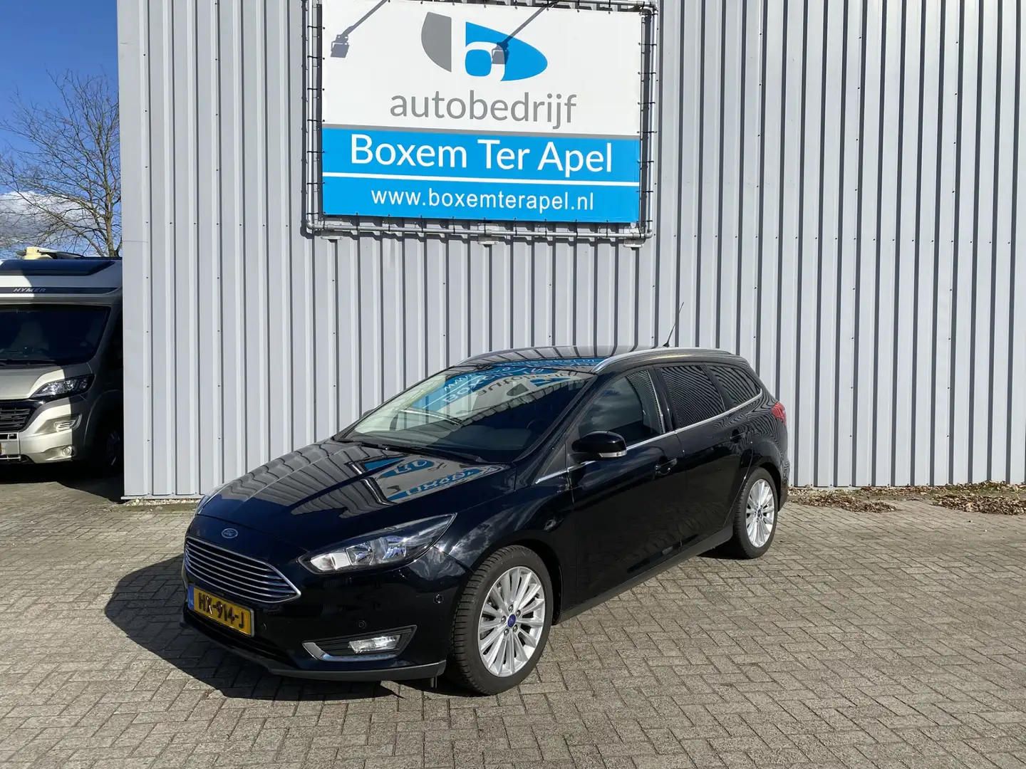 Ford Focus Wagon 1.0 Titanium Edition | Navigatie | Cruise Co Zwart - 1