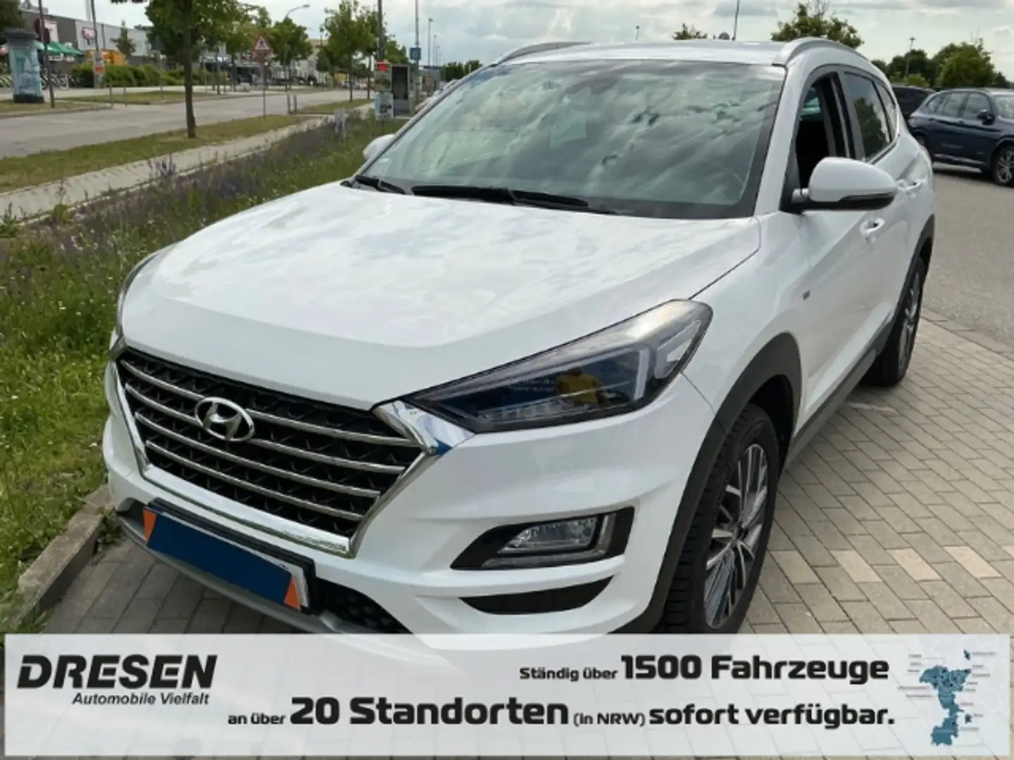 Hyundai TUCSON 2WD Automatik Style Mehrzonenklima DAB SHZ Lenkrad Weiß - 1