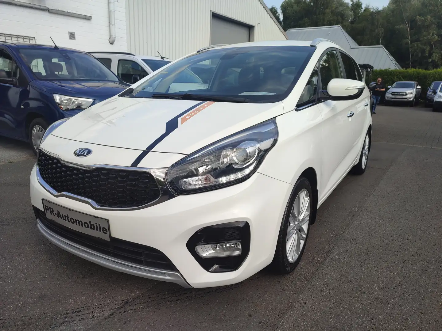 Kia Carens 1.6 GDI Klimaaut/Navi/PDC+Cam/Motor 0 KM Weiß - 1