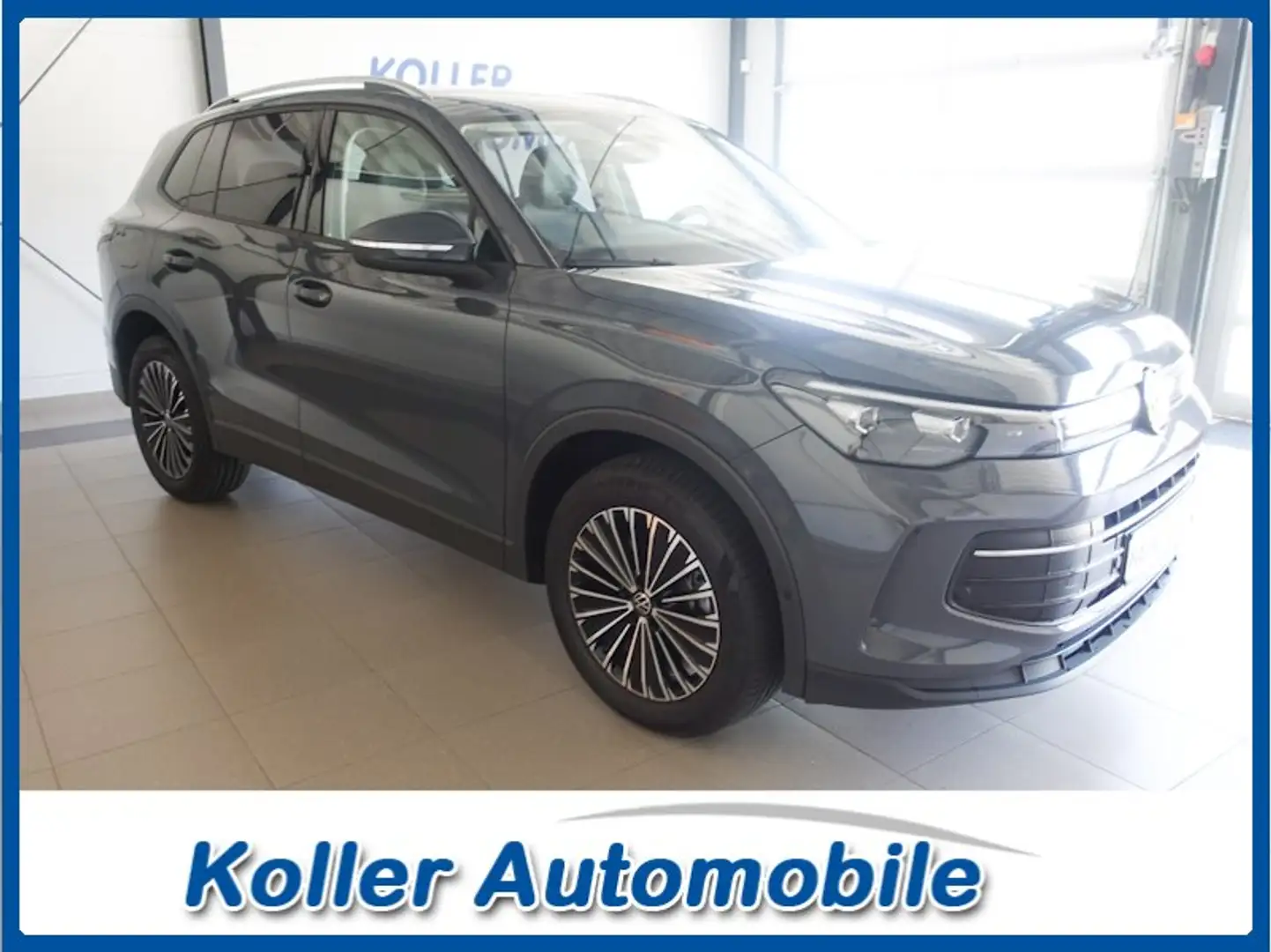 Volkswagen Tiguan 2.0 TDI DSG 4Motion AHK Navi el.Heckkl. Grau - 1