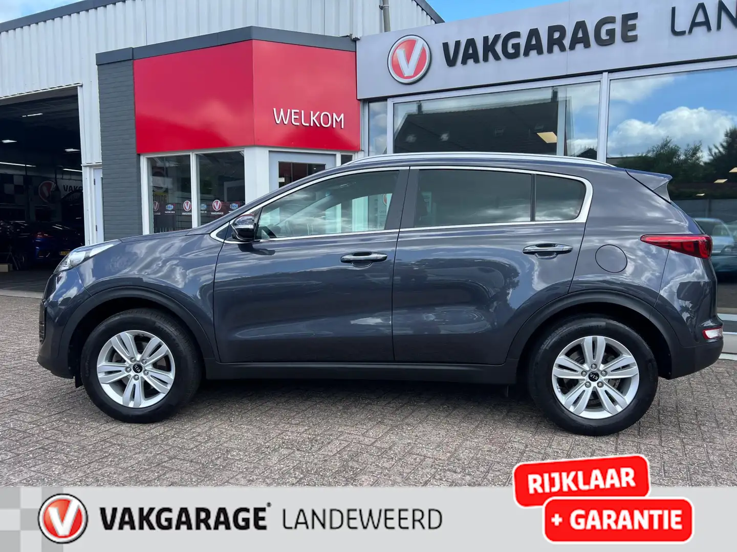 Kia Sportage 1.6 GDI ExecutiveLine, NAVI, Cruise, PDC, 1e Eigen Grijs - 2