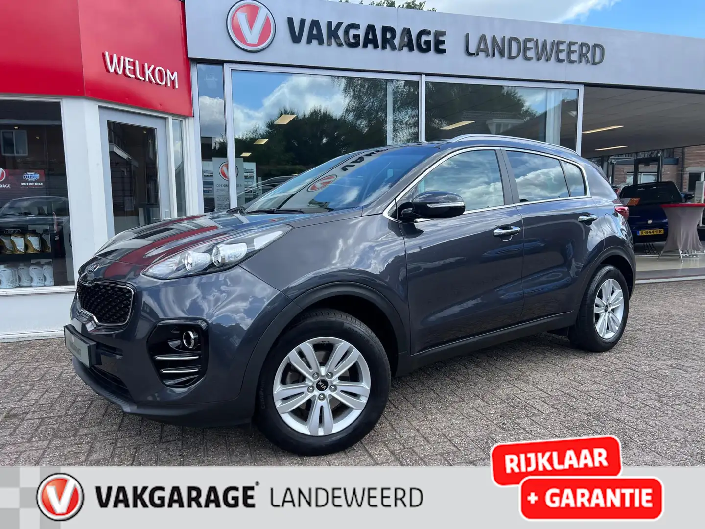 Kia Sportage 1.6 GDI ExecutiveLine, NAVI, Cruise, PDC, 1e Eigen Grijs - 1