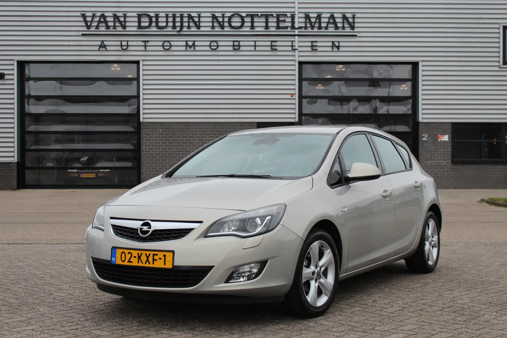 Opel Astra 1.6 Edition / Airco / Cruise / LMV 17" / N.A.P. Бежевий - 1