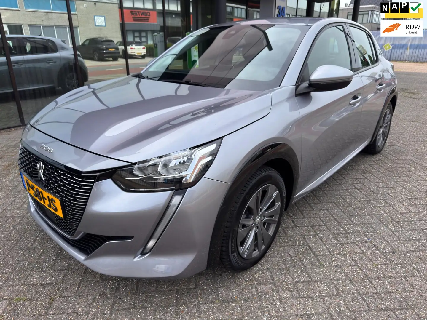 Peugeot e-208 EV Allure 50 kWh / SO91% / Carplay / Camera Gris - 1