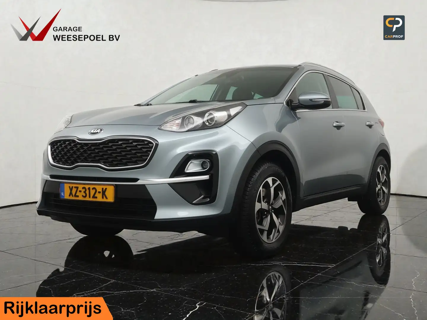 Kia Sportage 1.6 GDI DynamicLine - Navigatie - Camera - Climate Gris - 1