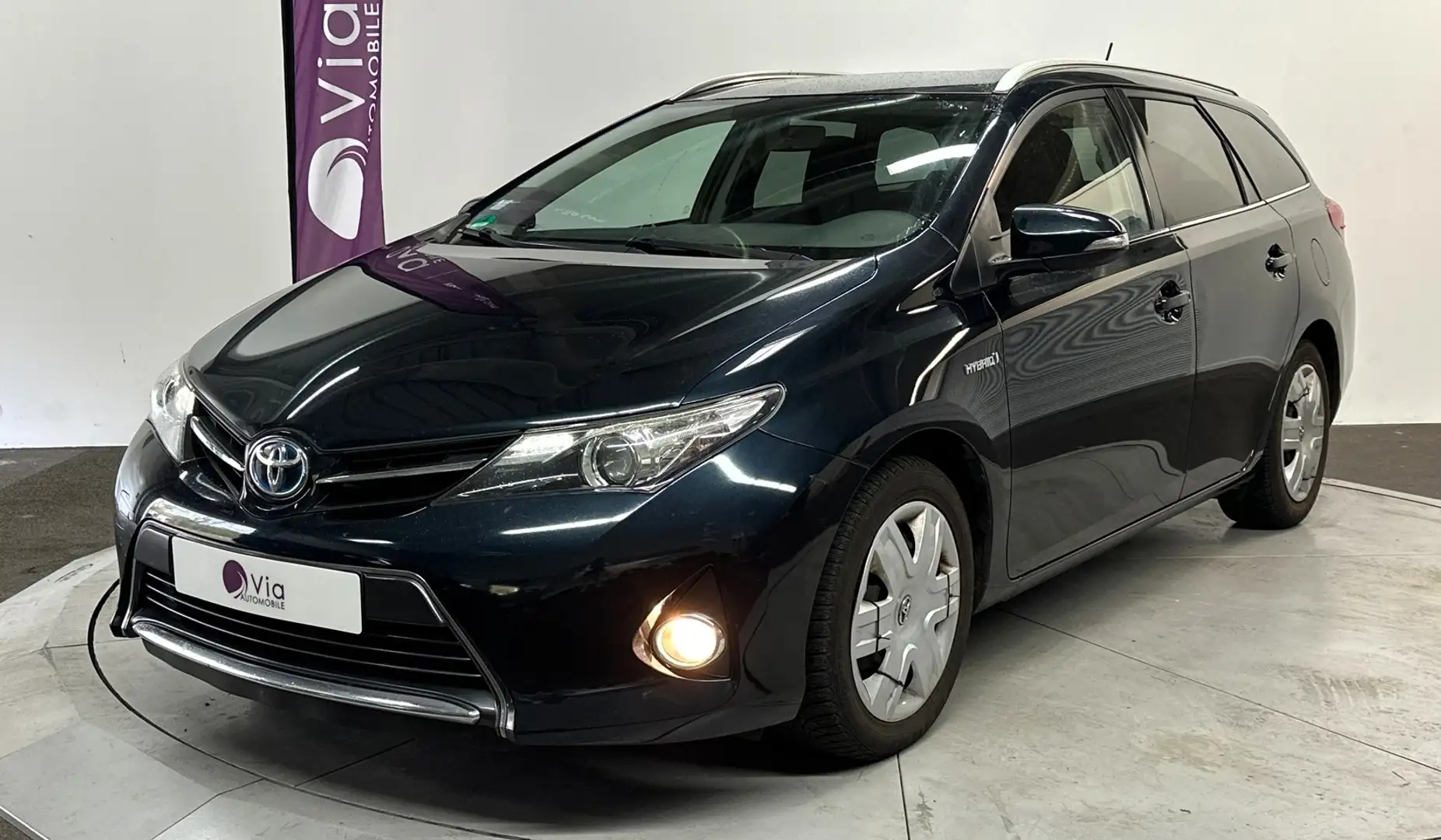Toyota Auris Hybride 136h Dynamic Blauw - 1