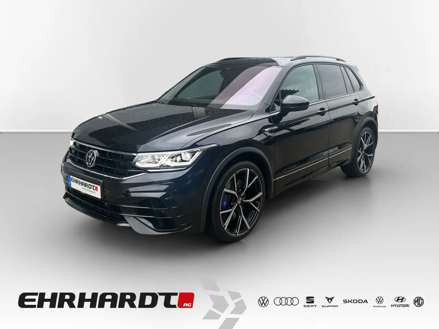 Volkswagen Tiguan 2.0 TSI DSG 4Motion R DCC PANO*HUD*HARMAN*NAV*S... Schwarz - 1