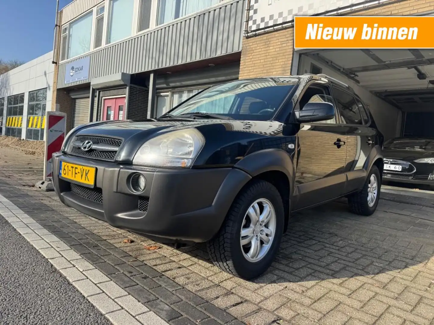 Hyundai TUCSON 2.0i Style Premium CLIMA LEER LMV NAP APK Schwarz - 1