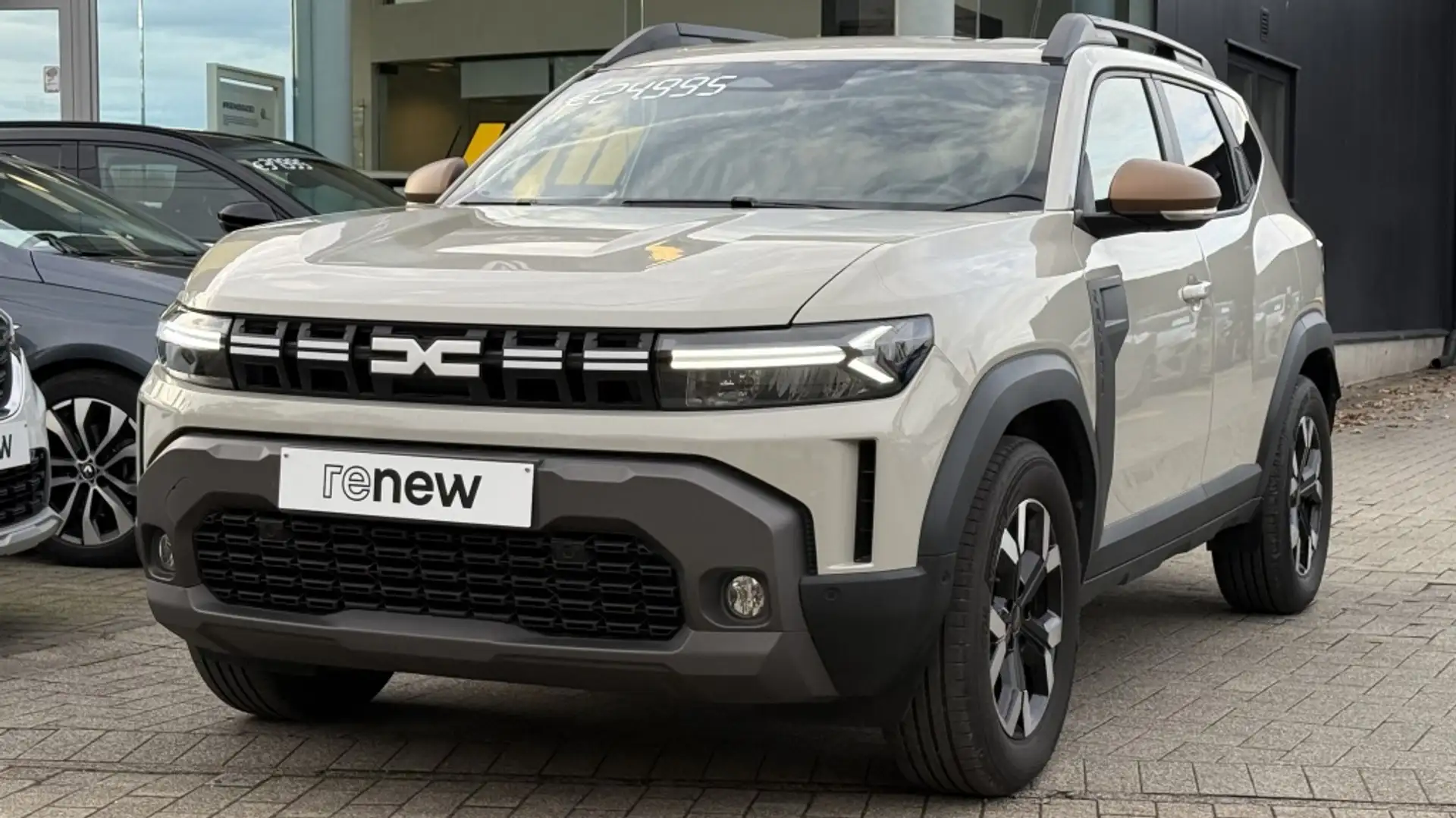 Dacia Duster III Hybrid 140 Extreme Beige - 1