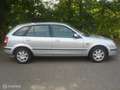 Mazda 323 Fastbreak 1.5 I 65 KW TSI 5 deurs 196973 KM Gris - thumbnail 2