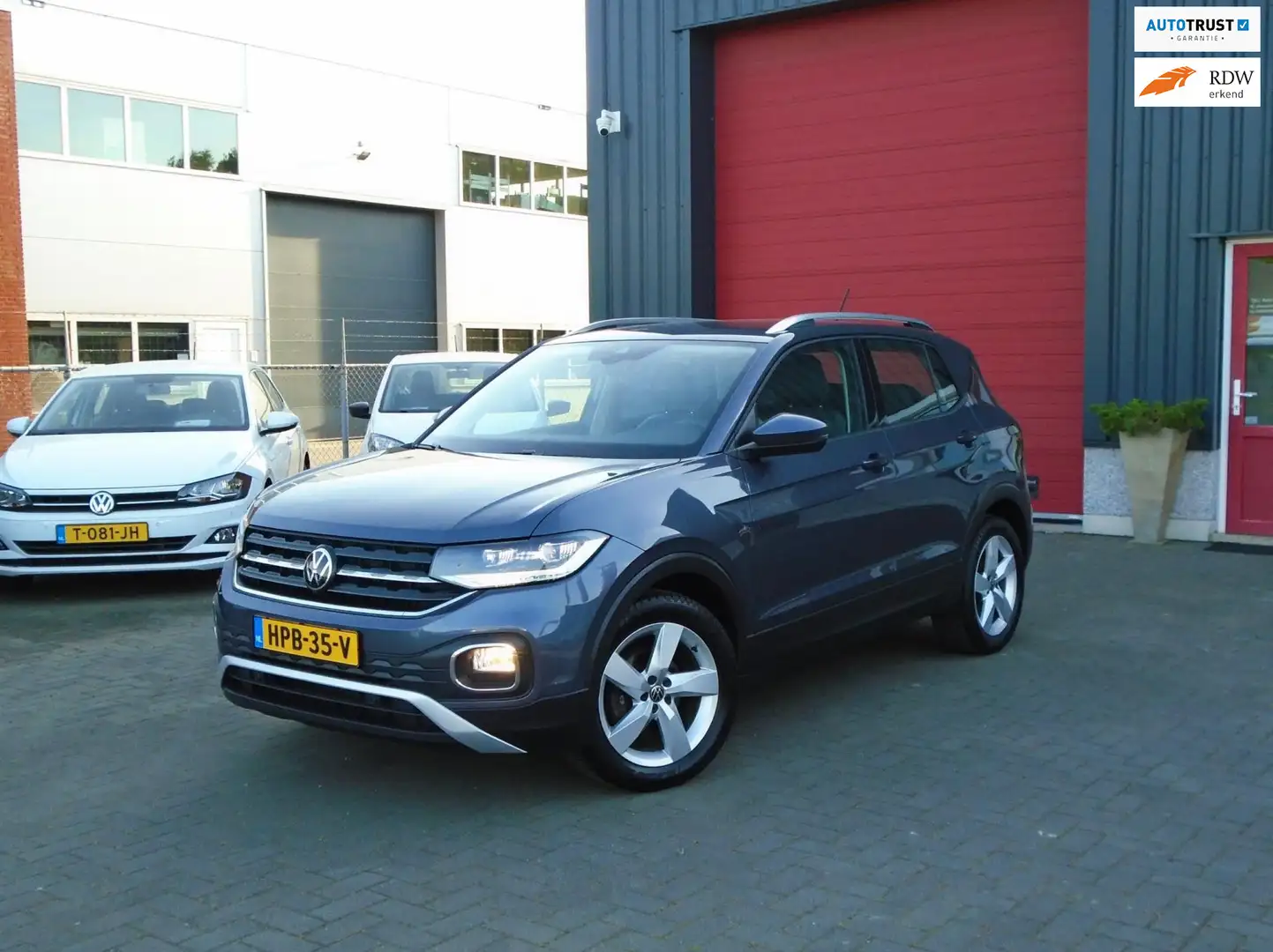 Volkswagen T-Cross 1.0 TSI Style,Automaat,Cruise,Clima Gris - 1