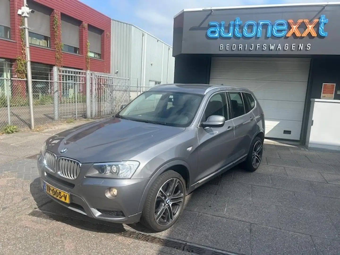 BMW X3 xDrive30d High Executive AIRCO I NAVI I AUTOMAAT I Grijs - 1
