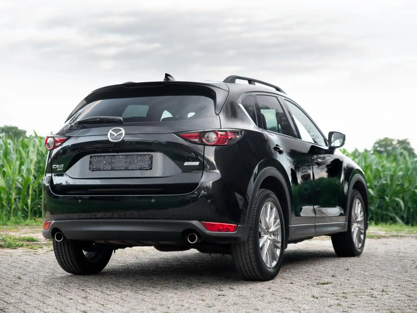 Mazda CX-5 2.5 4WD SkyActiv-G 194 Luxury Leer ACC Bose Keyles Zwart - 2