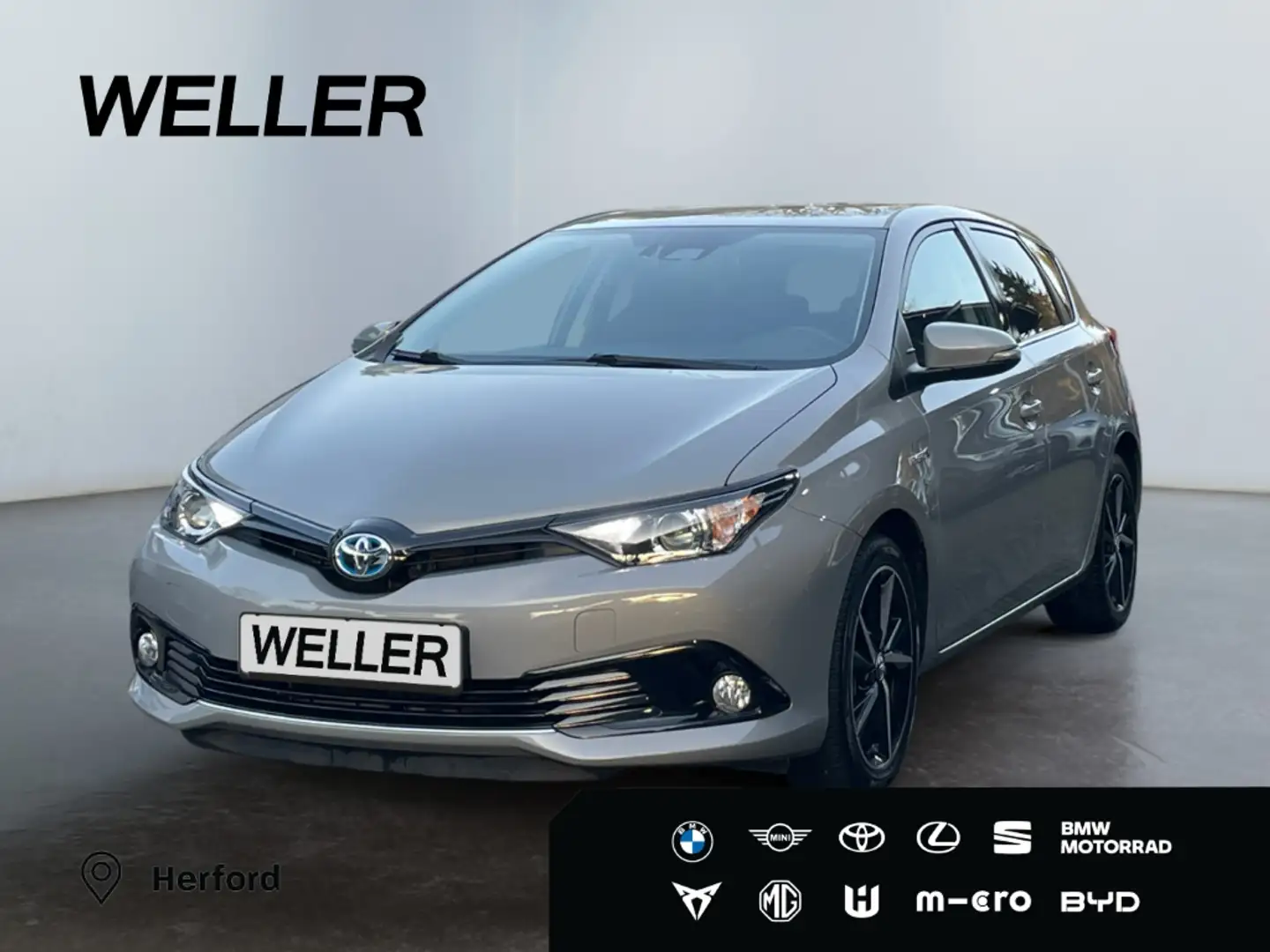 Toyota Auris 1.8 Hybrid Automatik Team D *CAM*SHZ*Navi* Grau - 1
