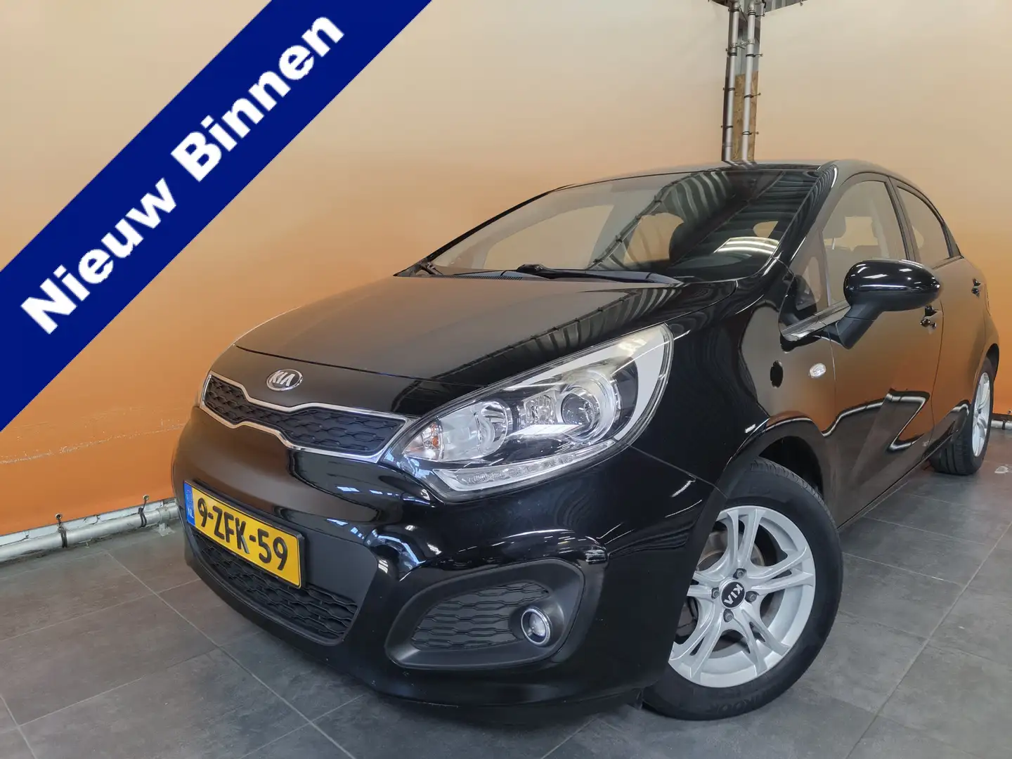 Kia Rio 1.2 CVVT BusinessLine 1e eigenaar | trekhaak | dea Zwart - 1
