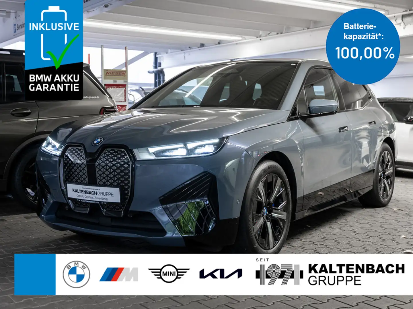 BMW iX xDrive 40 Sport PANO AHK HUD LED NAVI H/K Grijs - 1