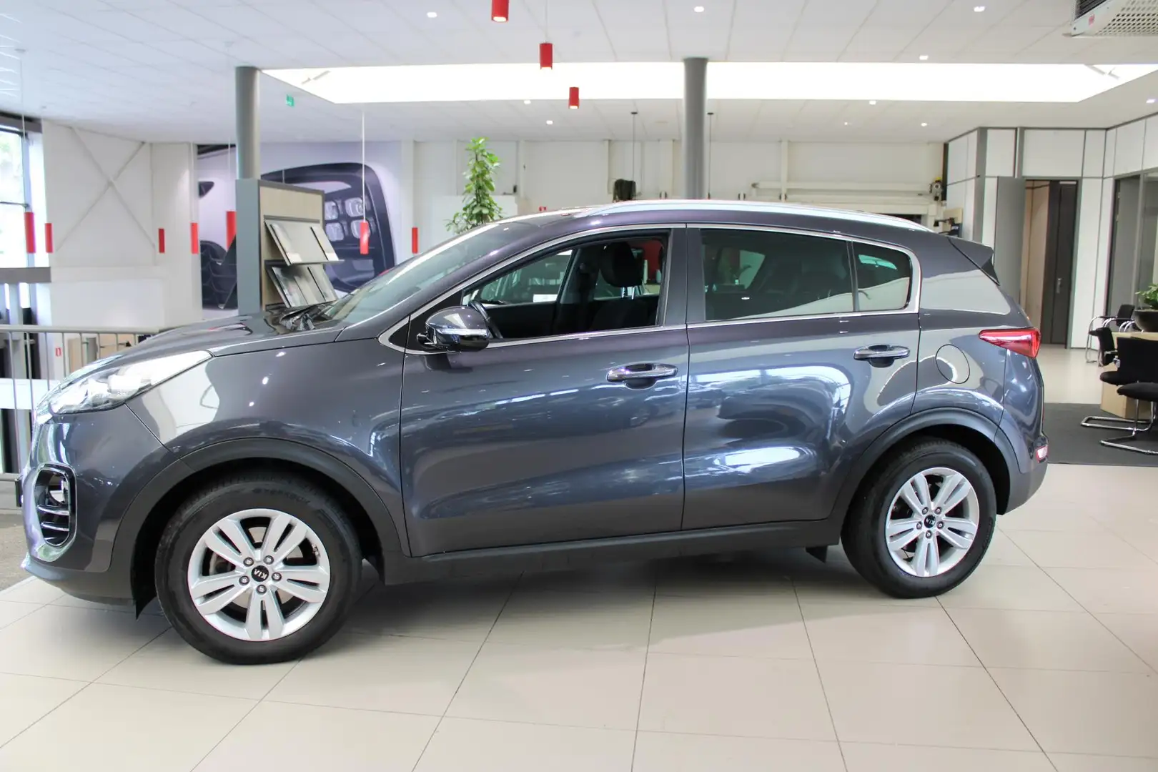 Kia Sportage 1.6 T-GDI 4WD DynamicLine l Automaat l Navigatie l Grijs - 2