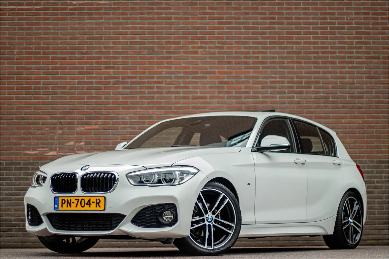 BMW 118 1-serie 118i High Executive, M Sport, 66.000km NAP Blanco - 1