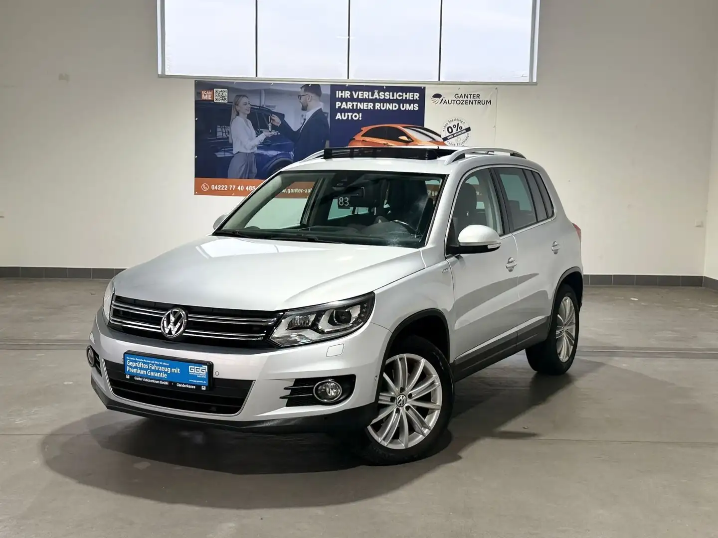 Volkswagen Tiguan 2.0 TDI Life 4Motion DSG XENON+NAVI+SHZ+ Zilver - 1