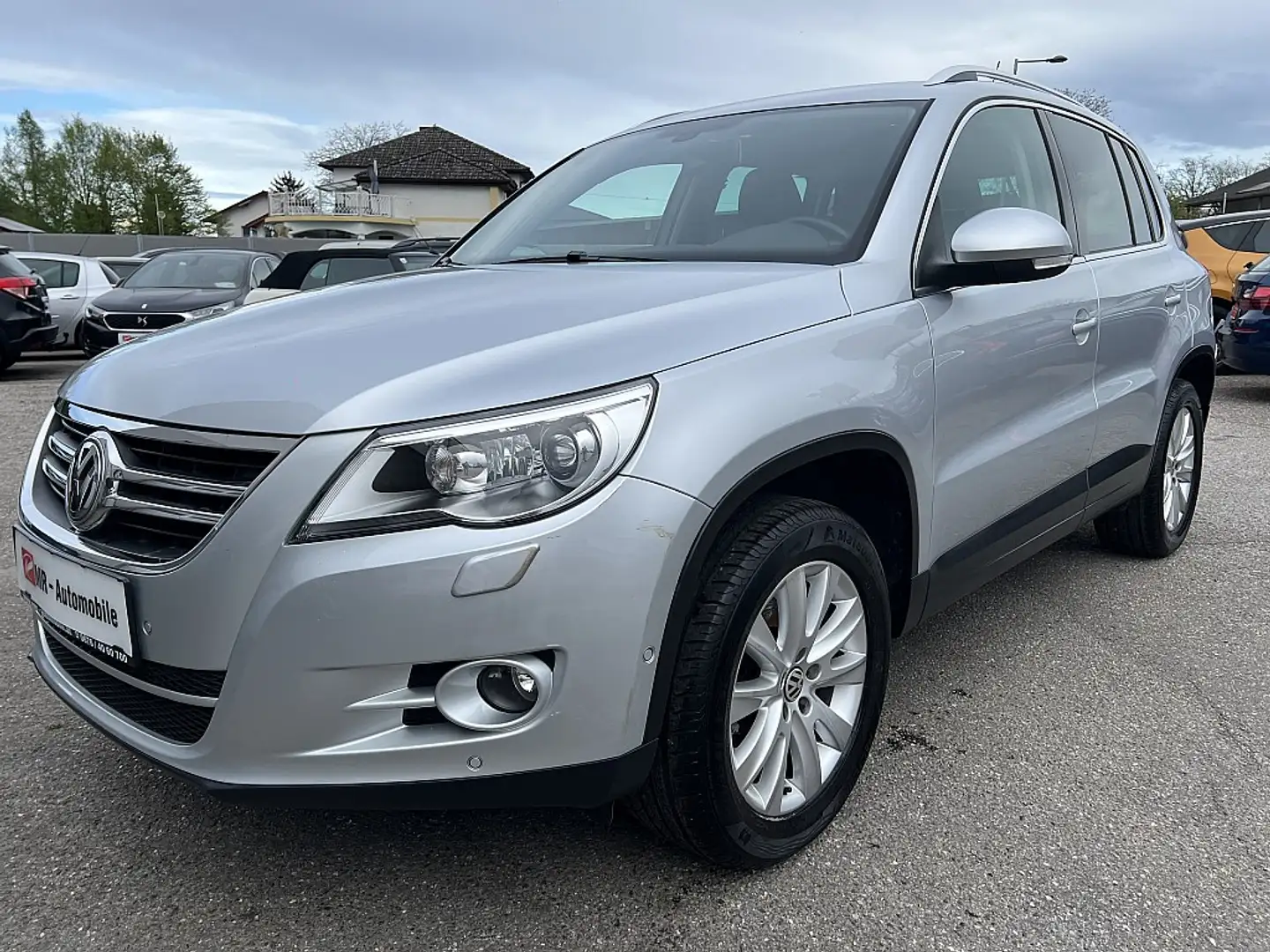 Volkswagen Tiguan 1,4 TSI Sport&Style BMT Grijs - 2