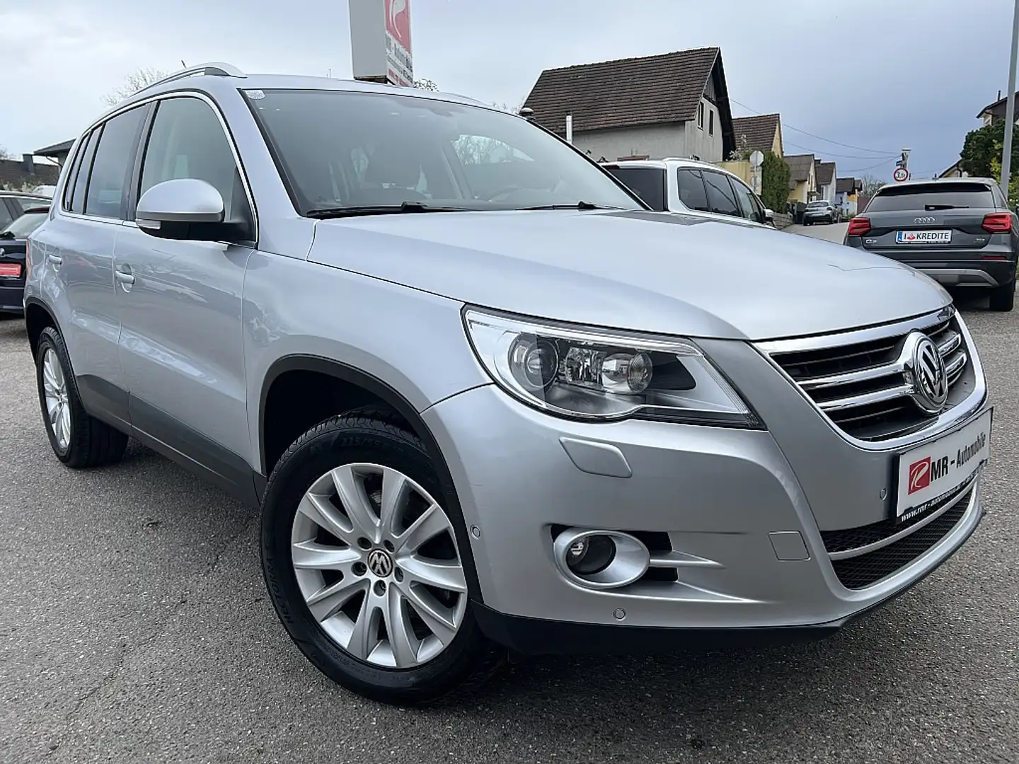 Volkswagen Tiguan 1,4 TSI Sport&Style BMT Grijs - 1