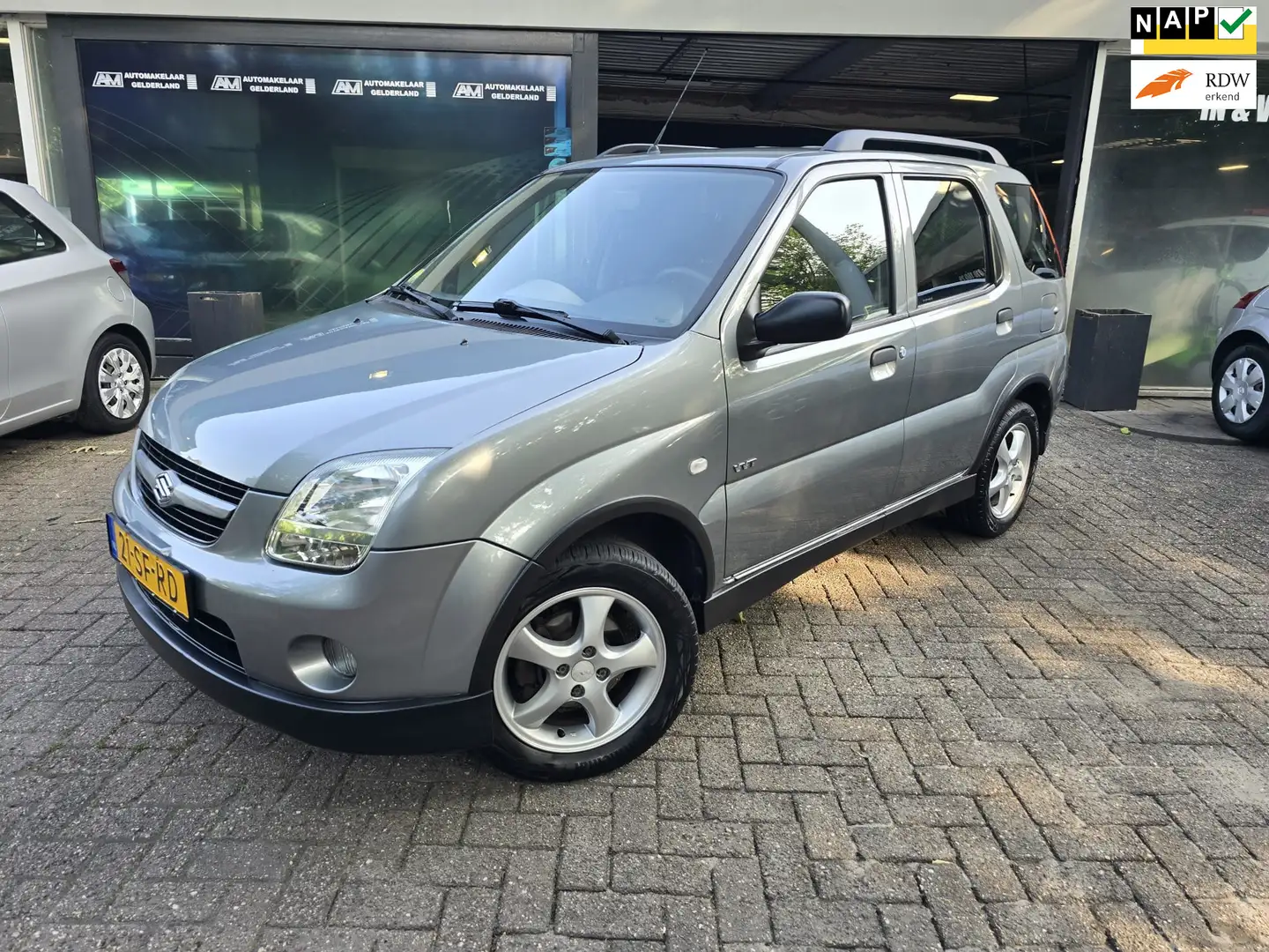 Suzuki Ignis 1.3-16V FreeStyle | 12MND GARANTIE | NW APK | AIRC Серый - 1