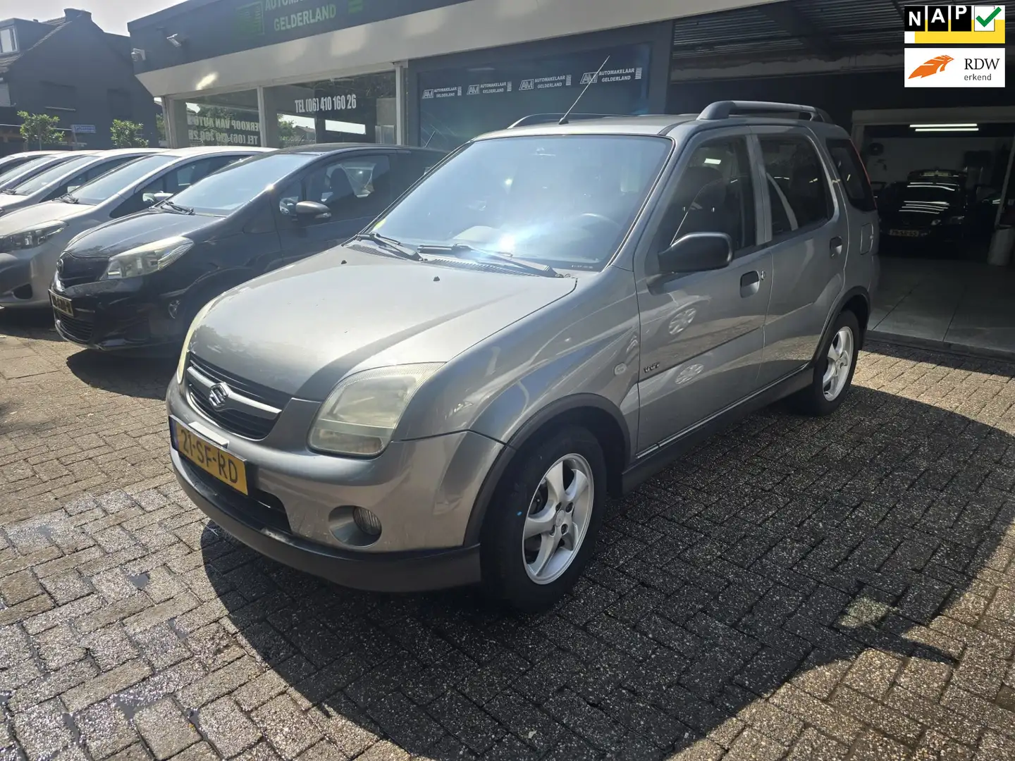 Suzuki Ignis 1.3-16V FreeStyle | 12MND GARANTIE | NW APK | AIRC Gris - 1