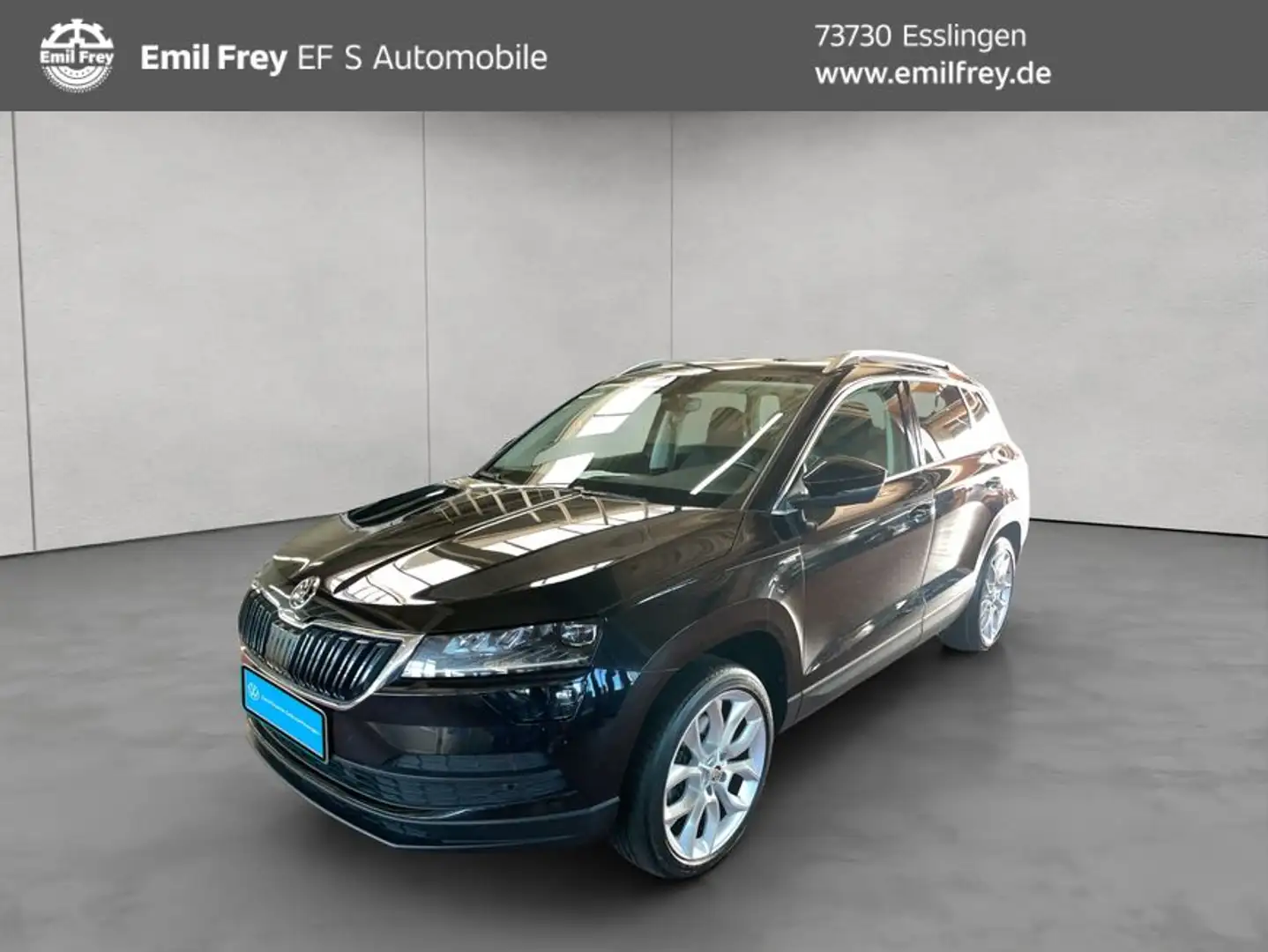 Skoda Karoq 2.0 TDI SCR 4x4 DSG Ambition AHK Pano Zwart - 1