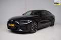 BMW i4 EDrive40 84 kWh M-SPORT / ORG.NED / CAMERA / TREKH Zwart - thumbnail 1