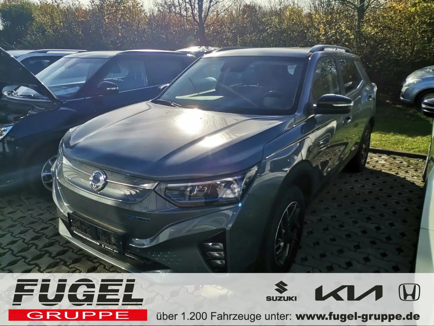 SsangYong Korando e-Motion 61,5 kWh Titanium Plus SD|LED|Navi|ACC Grau - 1