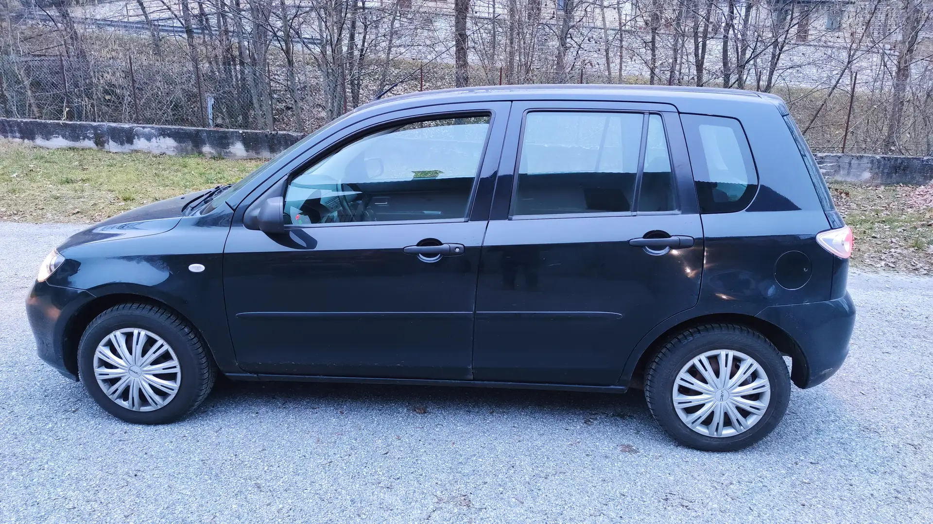Mazda 2 1.2 Style c/clima Nero - 1