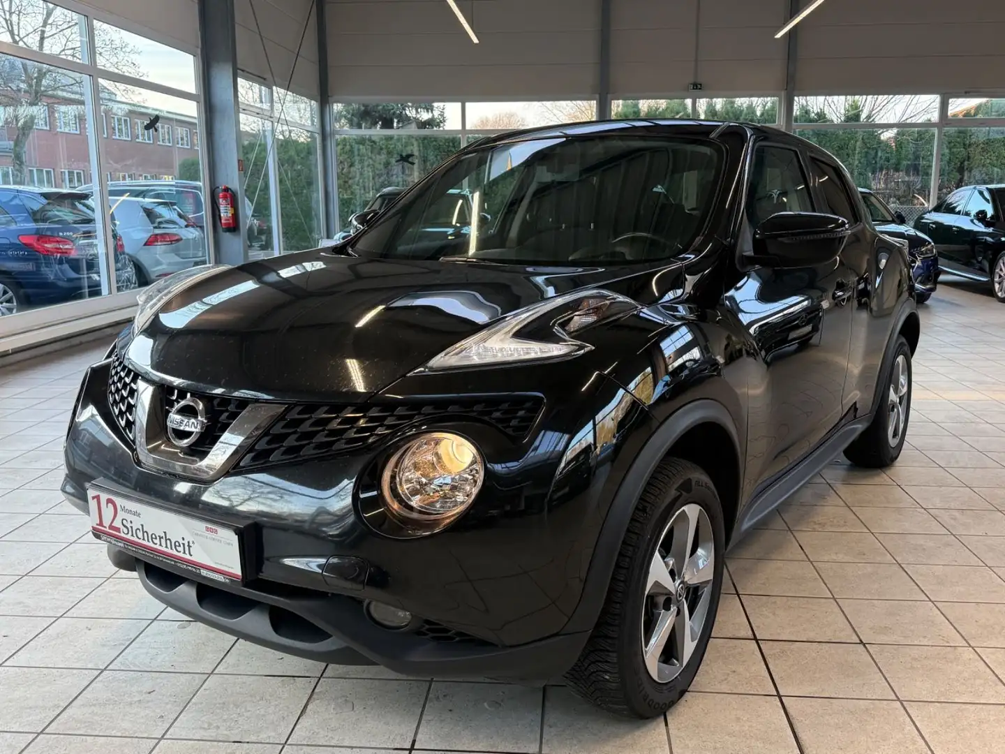 Nissan Juke Acenta 1.6 Ltr Automatik / R-Cam/Navi Noir - 1