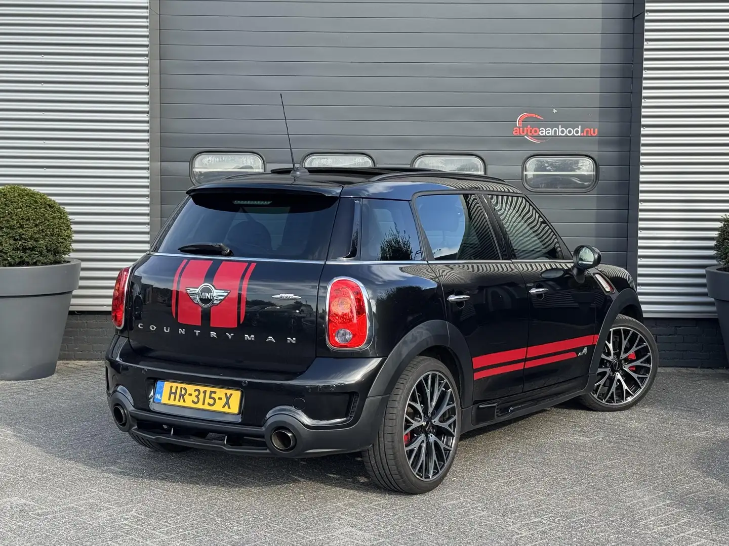 MINI John Cooper Works Countryman Mini 1.6 ALL4 Chili | Panoramadak | Navigatie | 19 Noir - 2