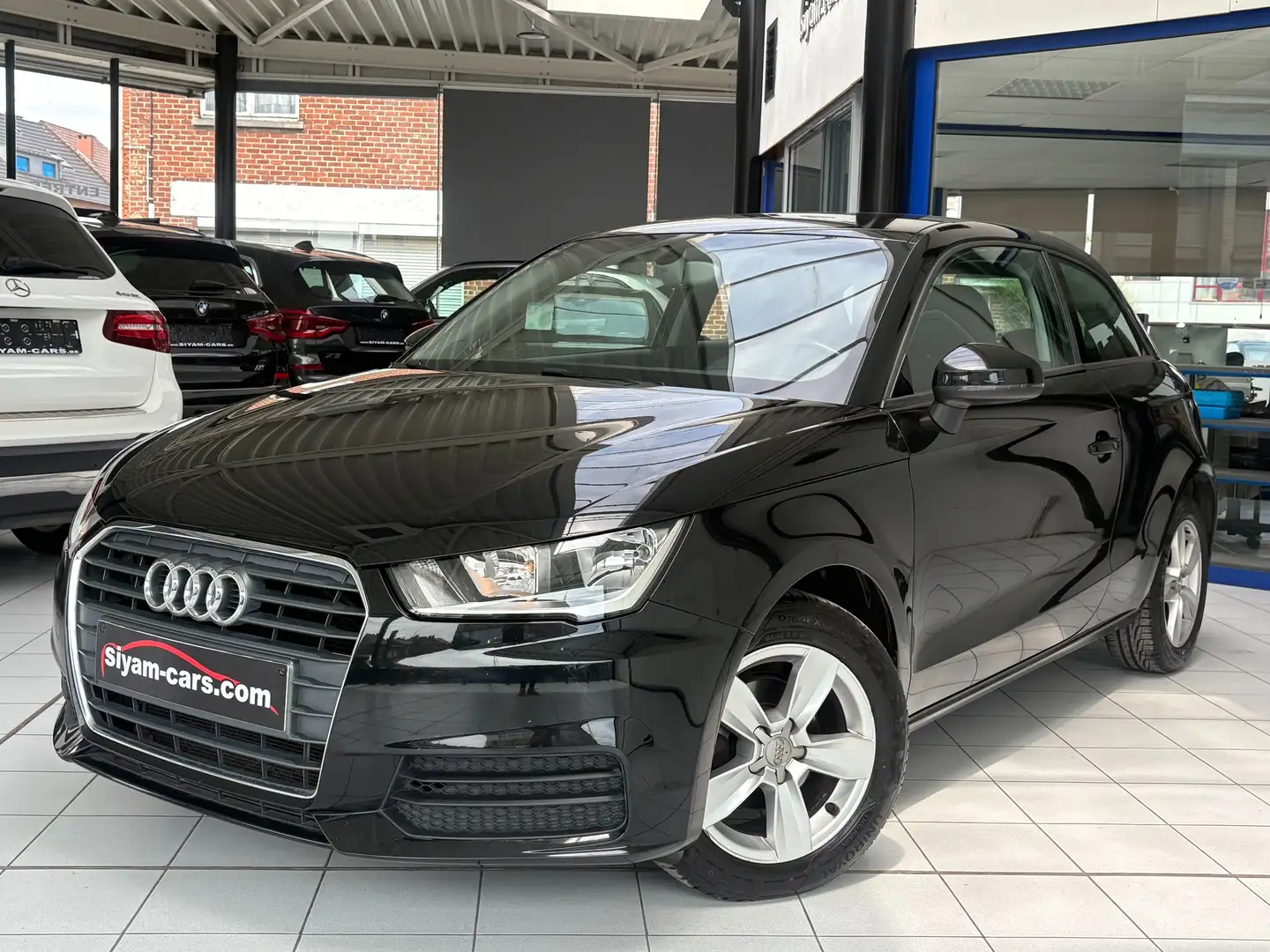 Audi A1 A1 1.0 TFSI * GPS * PDC * CLIM * JANTES * Zwart - 1