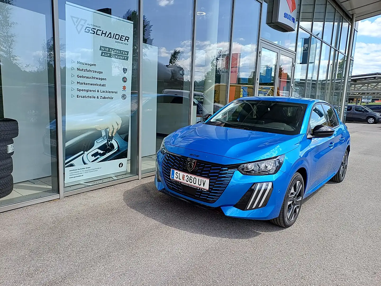 Peugeot e-208 156PS 54kWh Allure Blau - 1