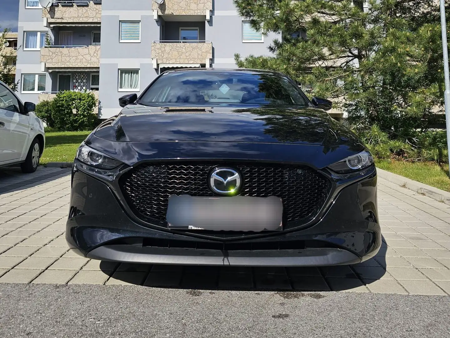 Mazda 3 e-Skyactiv-G122 Homura Limousine Schwarz - 1