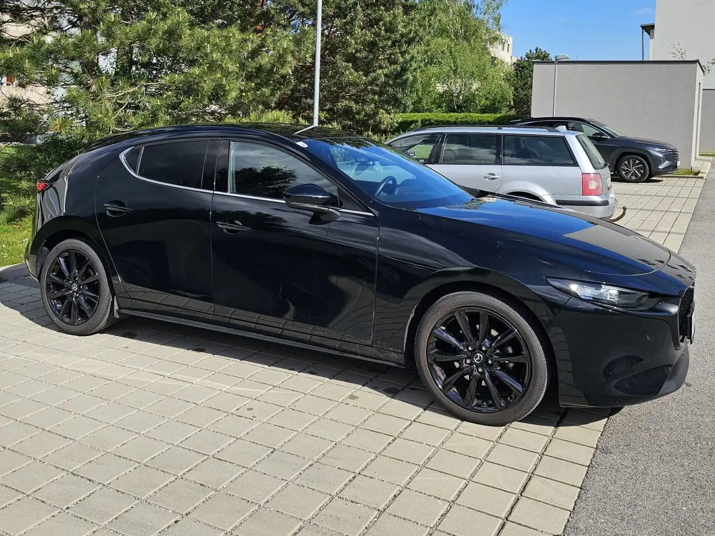 Mazda 3 e-Skyactiv-G122 Homura Limousine Schwarz - 2
