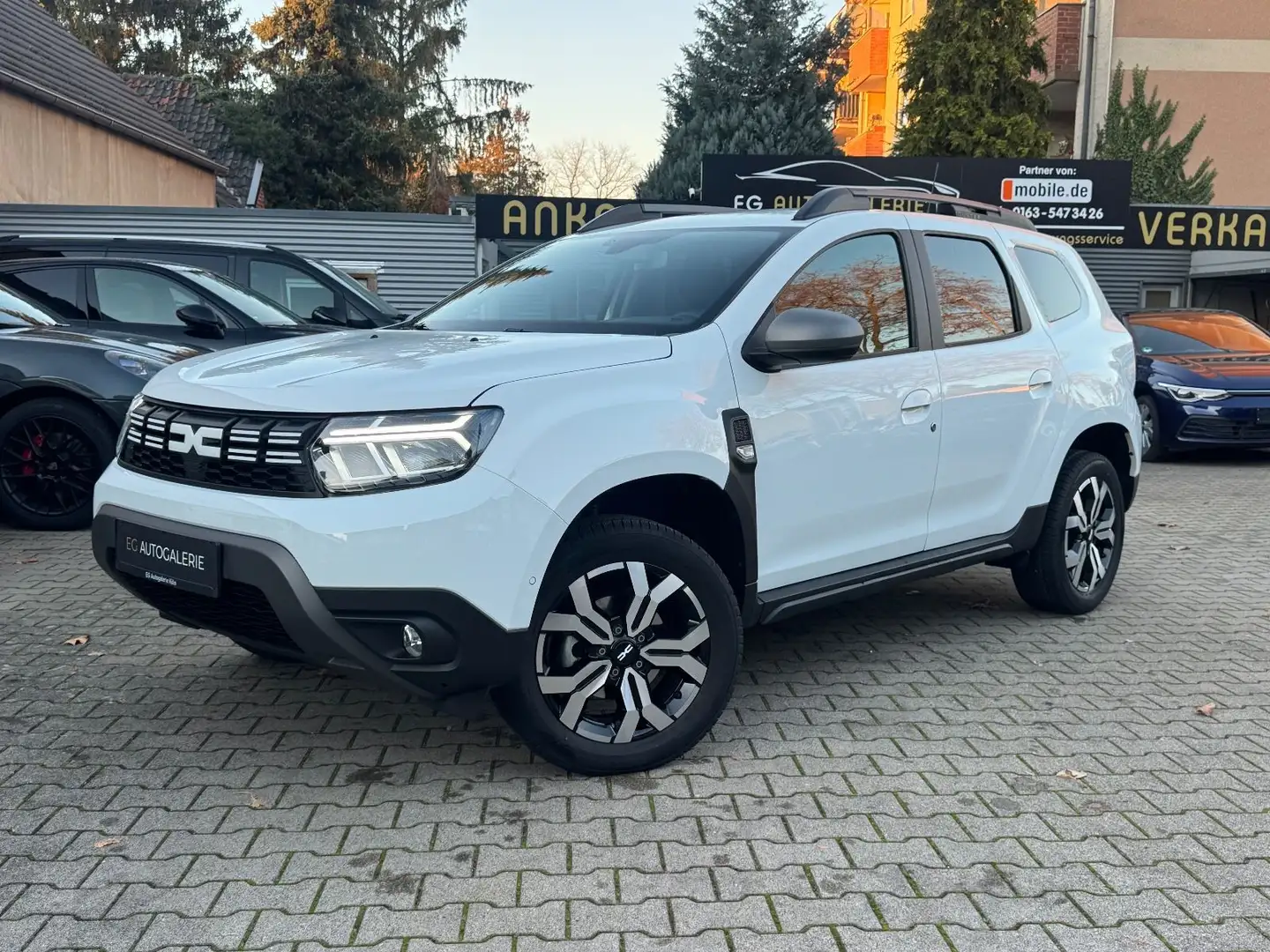 Dacia Duster II Journey*R-Kamera*KeyLess*AHK Weiß - 2
